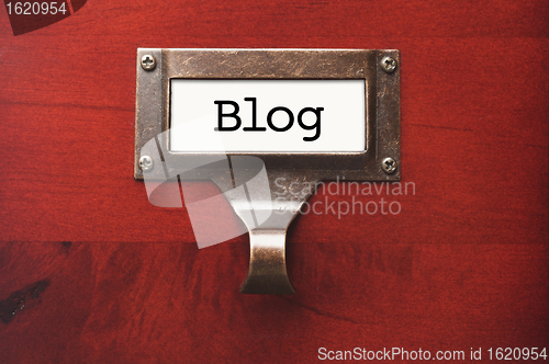 Image of Lustrous Wooden Cabinet with Blog File Label