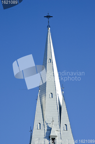 Image of Church tower cross religious building blue sky 
