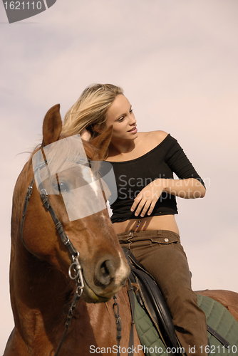 Image of blond riding girl