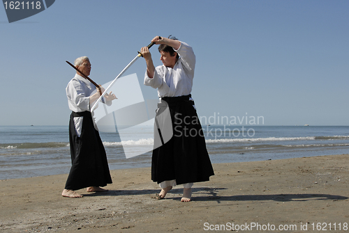 Image of training of Aikido on the beach