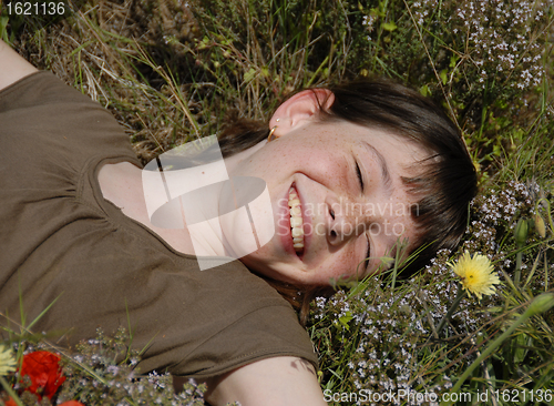 Image of smiling girl in field