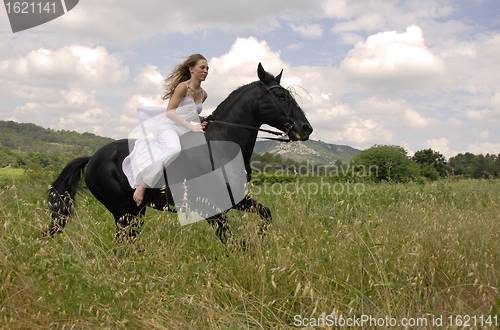 Image of riding wedding woman