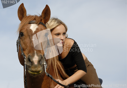 Image of teen and horse 