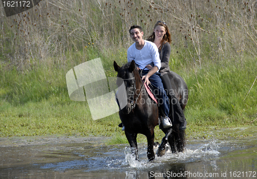 Image of riding lovers
