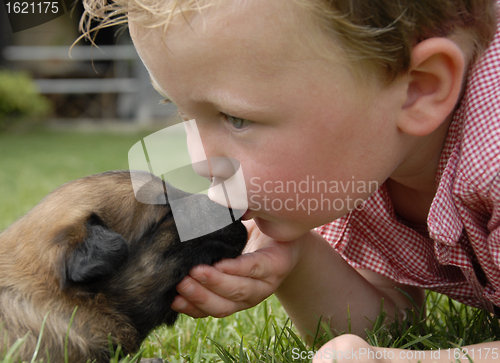 Image of kissing baby