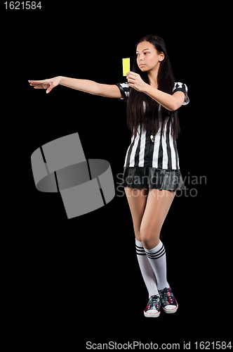 Image of Sexy Soccer Referee with yellow card