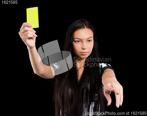 Image of Sexy Soccer Referee with yellow card