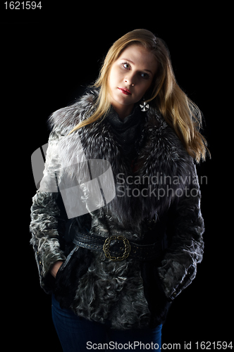 Image of Attractive woman in fur coat