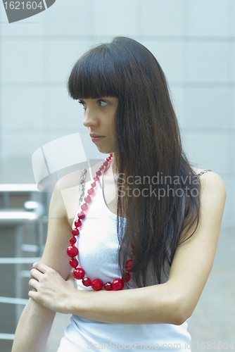 Image of Girl with red beads