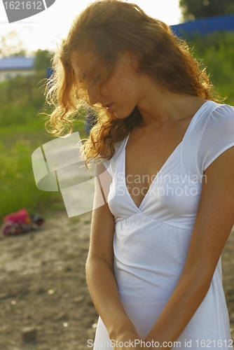 Image of Young woman with white scarf