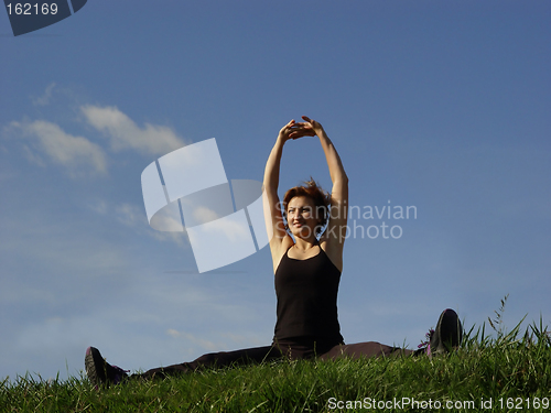 Image of Beautiful woman in grass