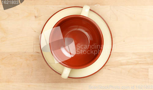 Image of Cup of soup on a plate