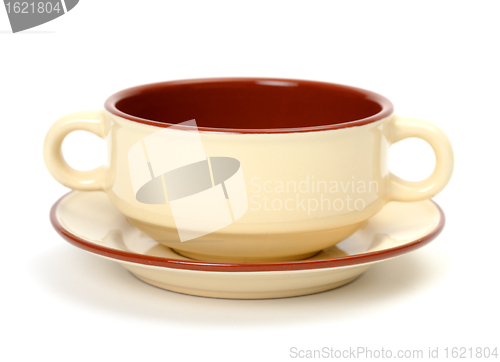 Image of Cup of soup on a plate