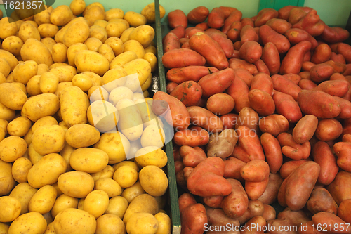 Image of pile of potatoes on a market stall