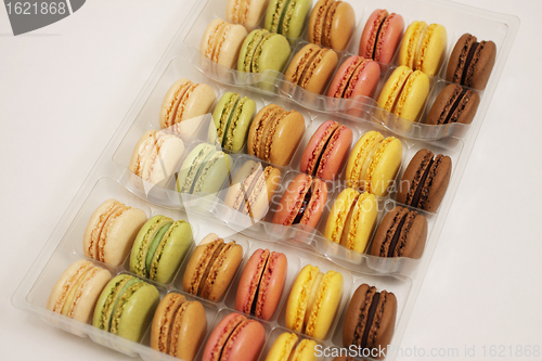 Image of assortment of macaroons on a white background