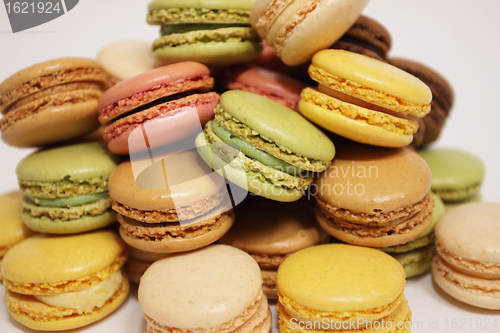 Image of assortment of macaroons on a white background