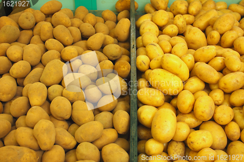 Image of pile of potatoes on a market stall