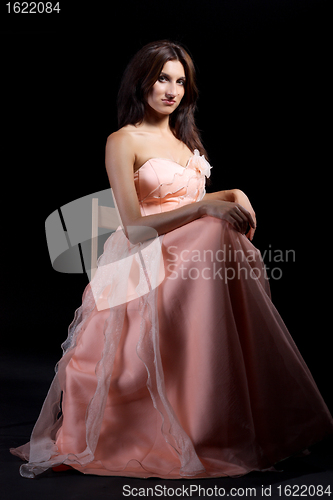 Image of Portrait of young women dressed in a pink dress