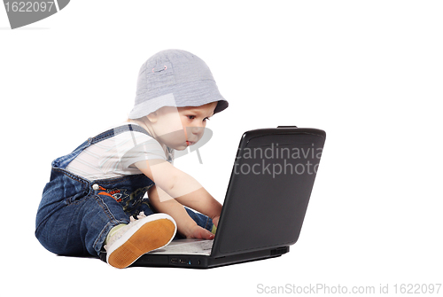 Image of Little boy with a laptop