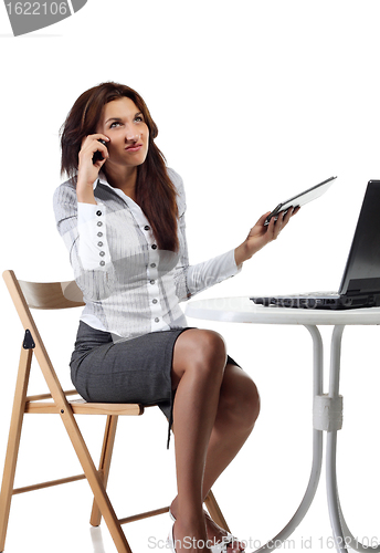 Image of Young women talking by phone