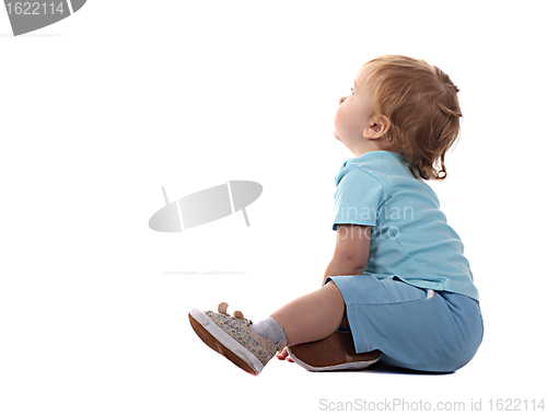 Image of Little boy sitting