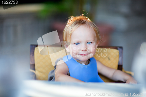 Image of Toddler girl at mealtime