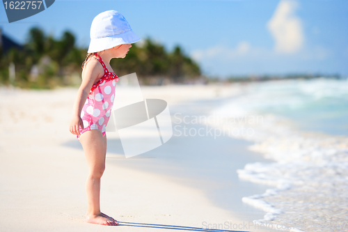 Image of Little girl at tropical beach