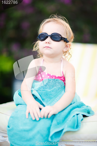 Image of Little girl in swimming glasses