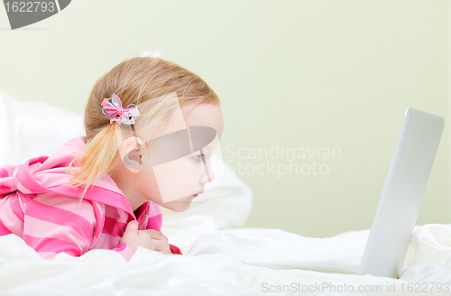 Image of Little girl with laptop