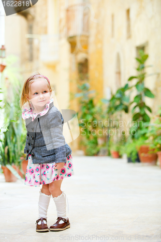 Image of Little girl portrait outdoors