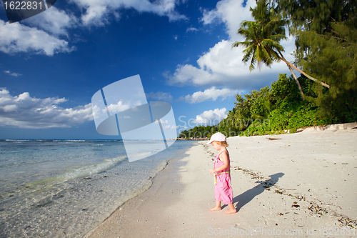 Image of Little girl on tropical beach