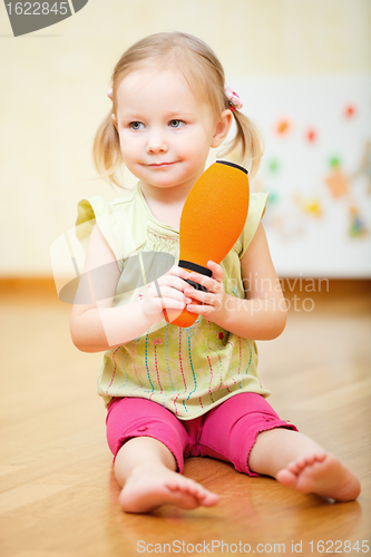 Image of Toddler girl playing