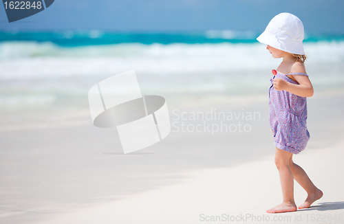 Image of Little cute girl at beach