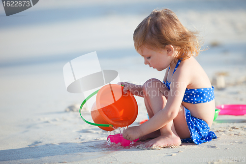 Image of Adorable little girl at beach