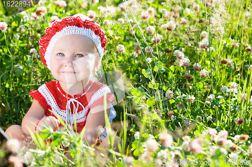 Image of Portrait of toddler girl in meadow