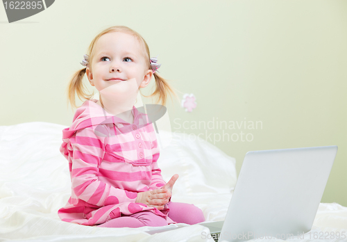 Image of Little girl with laptop