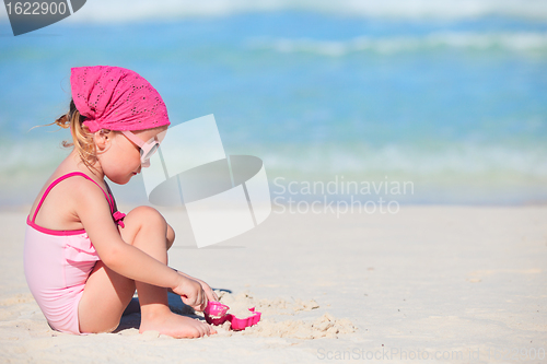 Image of Adorable little girl at beach