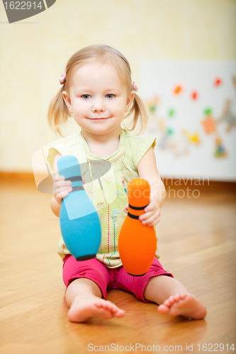 Image of Toddler girl playing