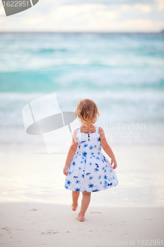Image of Little girl on tropical beach