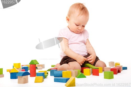 Image of Girl playing with blocks