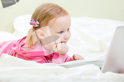 Image of Little girl with laptop