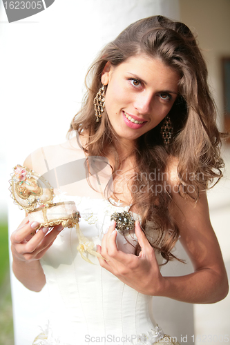 Image of young girl with gift in hand