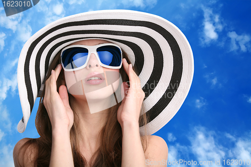 Image of pretty girl in striped hat