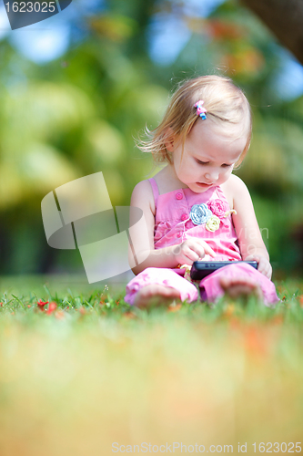 Image of Toddler girl at summer