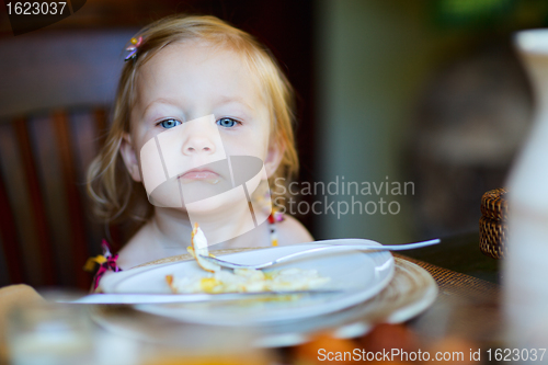 Image of Toddler girl having breakfast