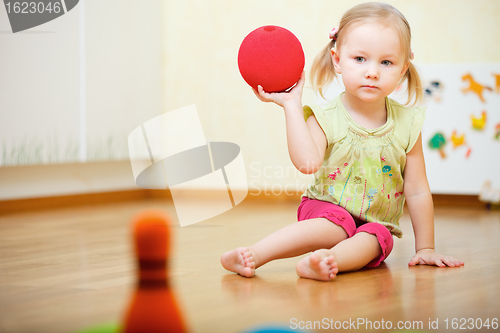 Image of Toddler girl playing