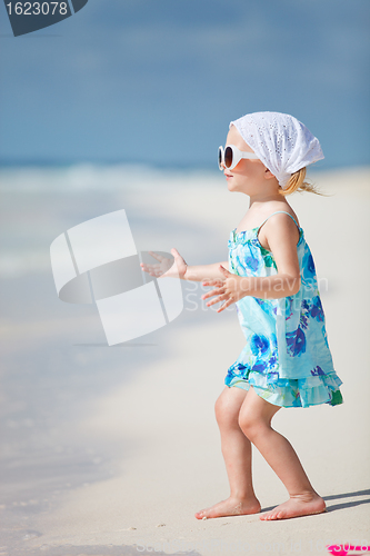 Image of Adorable little girl at beach