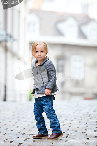 Image of Little girl in city