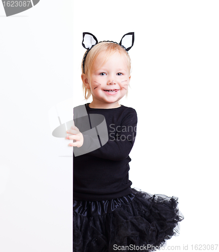 Image of Girl in black cat costume with banner