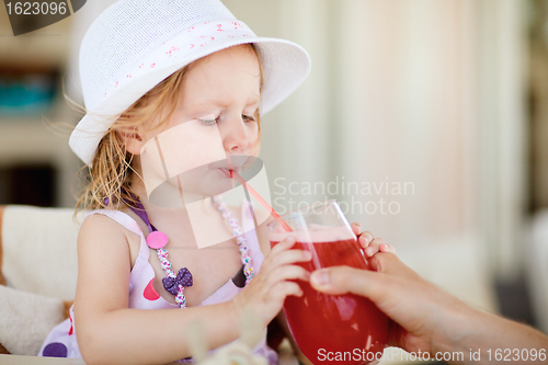 Image of Cute little girl in restaurant